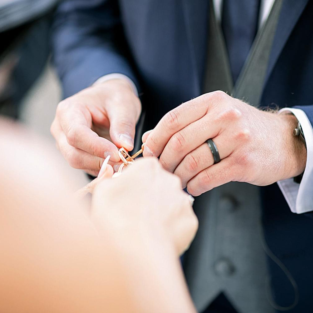 Couple Putting Rings On